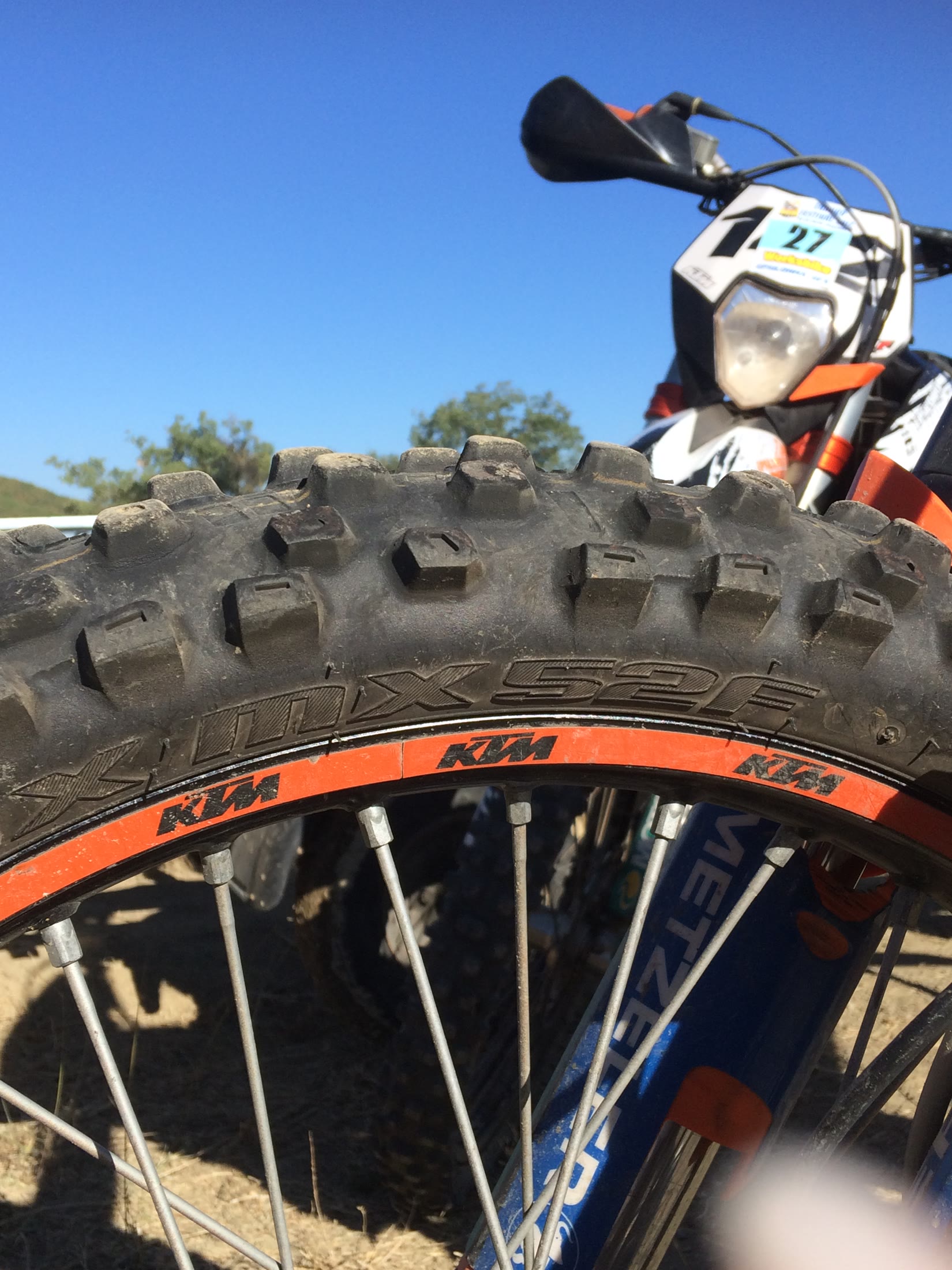 Close-up of an off-road motorcycle wheel and race bike